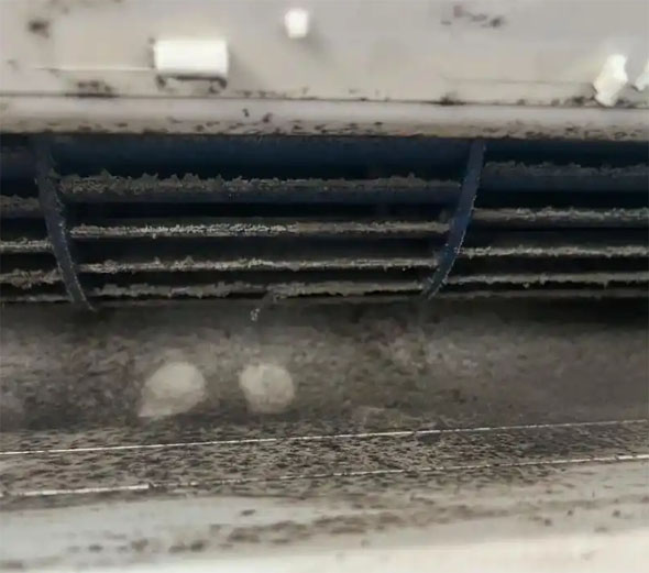 三明市空调吹的风有股烧焦味是怎么回事